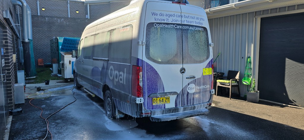 Commercial fleet van snow foam wash on site